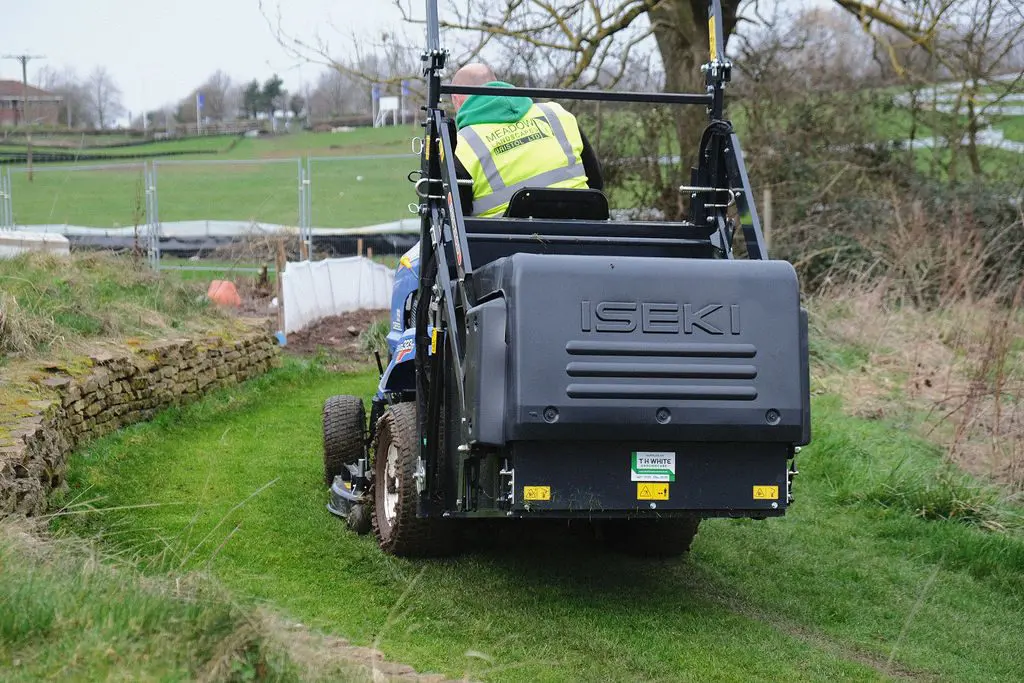 Park Maintenance with a sit on mower